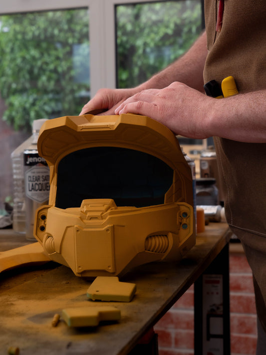 Halo helmet being sanded