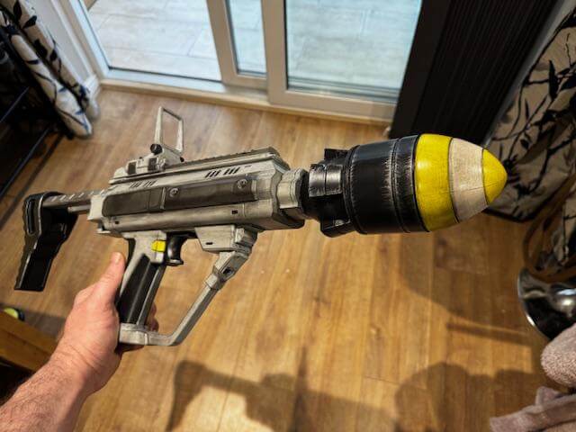Helldivers Ultimatum Prop in hand scale view durable sci fi sidearm replica Helldivers cosplay weapon
