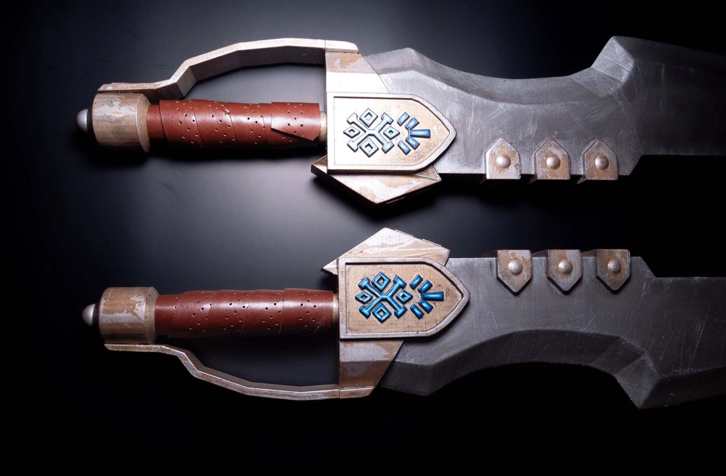 Monster Hunter dual blades full set front view with leather wrapped handles