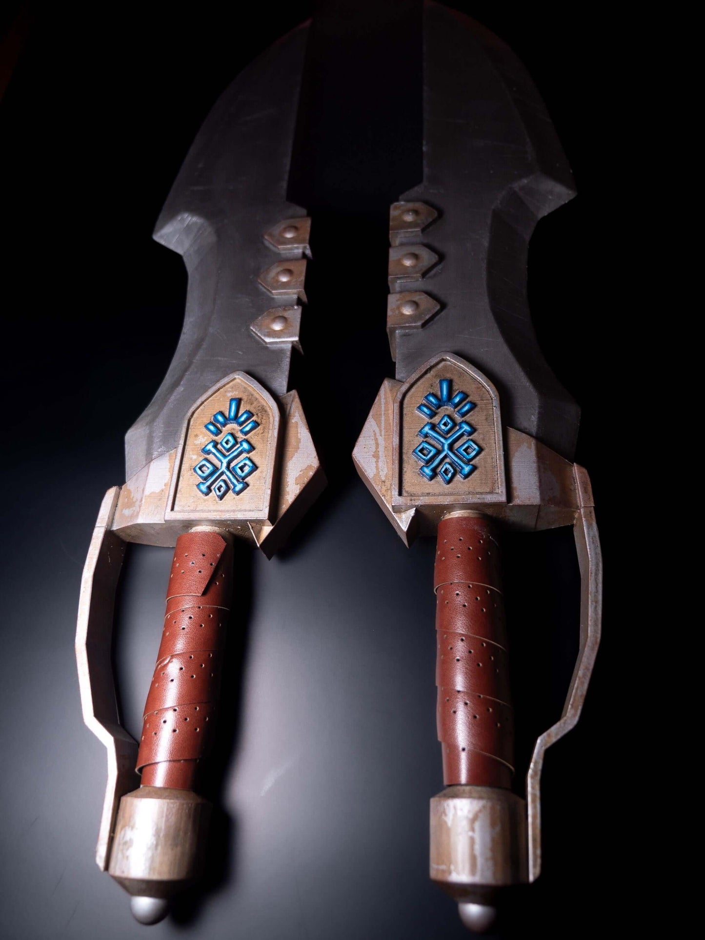 Monster Hunter dual blades close up on handle angled view