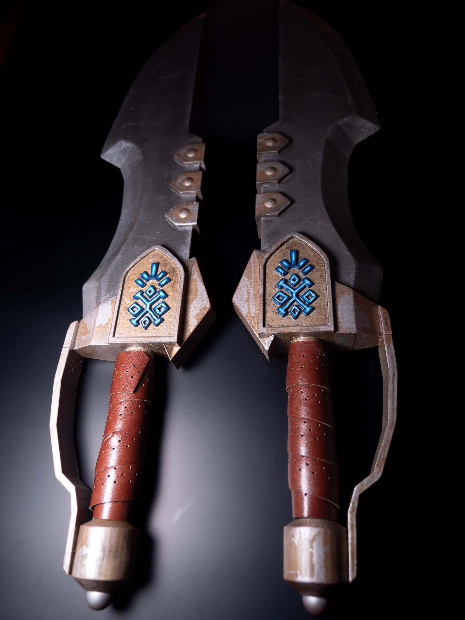 Monster Hunter dual blades close up on handle angled view